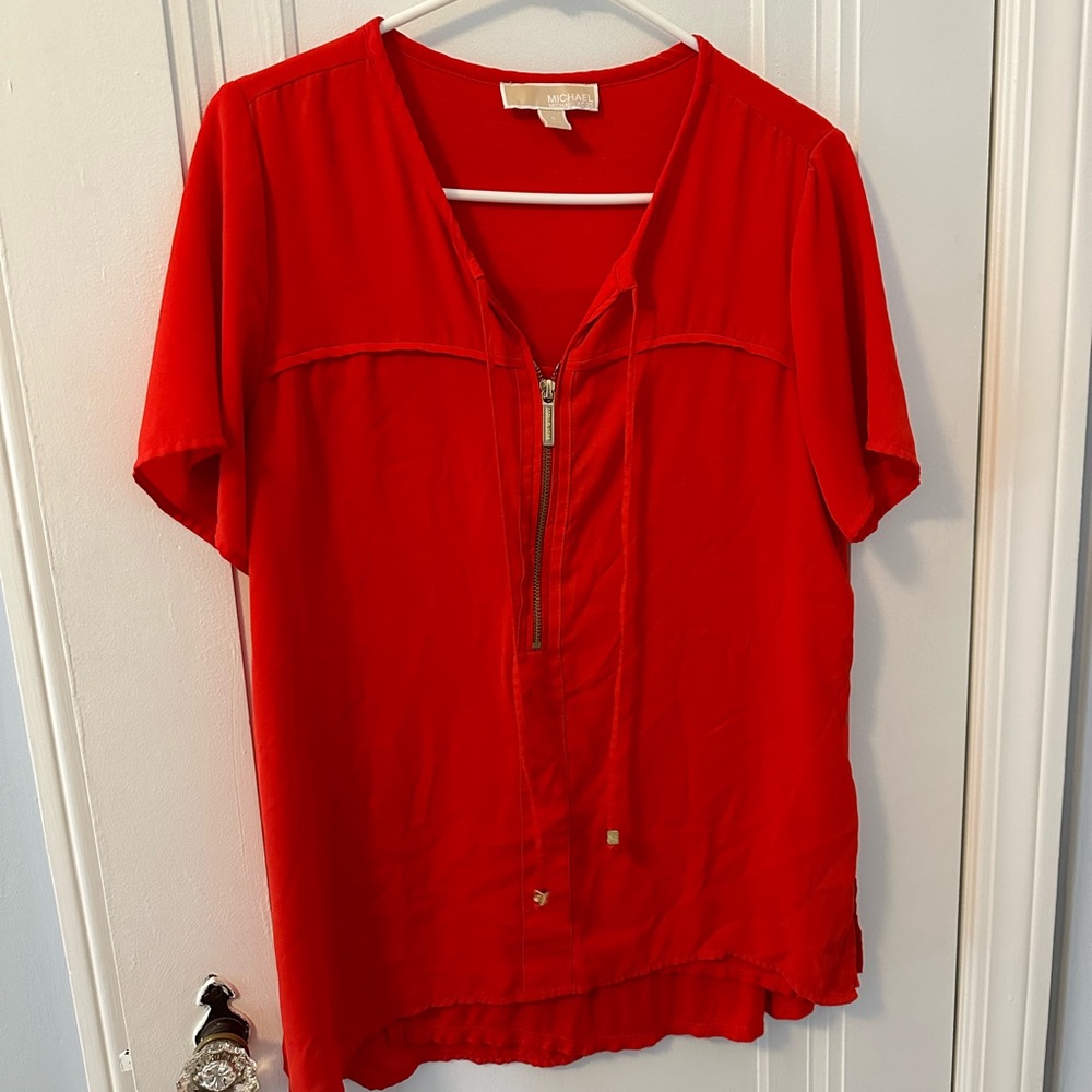 Orange Michael kohrs top